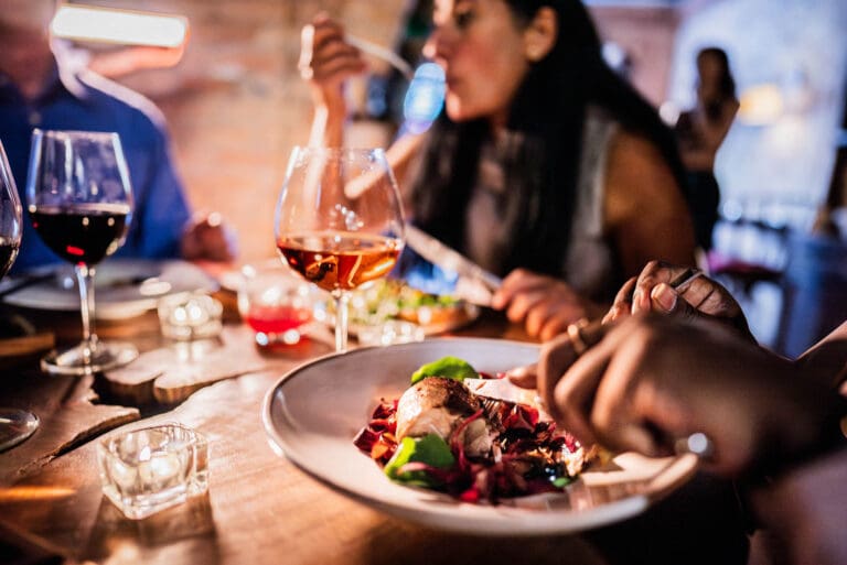 friends eating and drinking wine